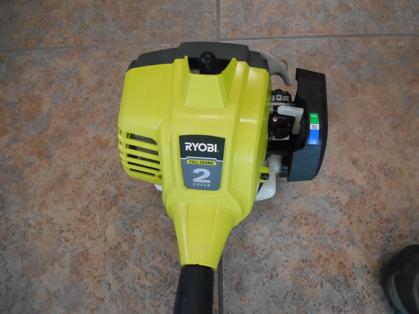 RYOBI 25 cc 2-Stroke Attachment Capable Full Crank Curved Shaft String Trimmer