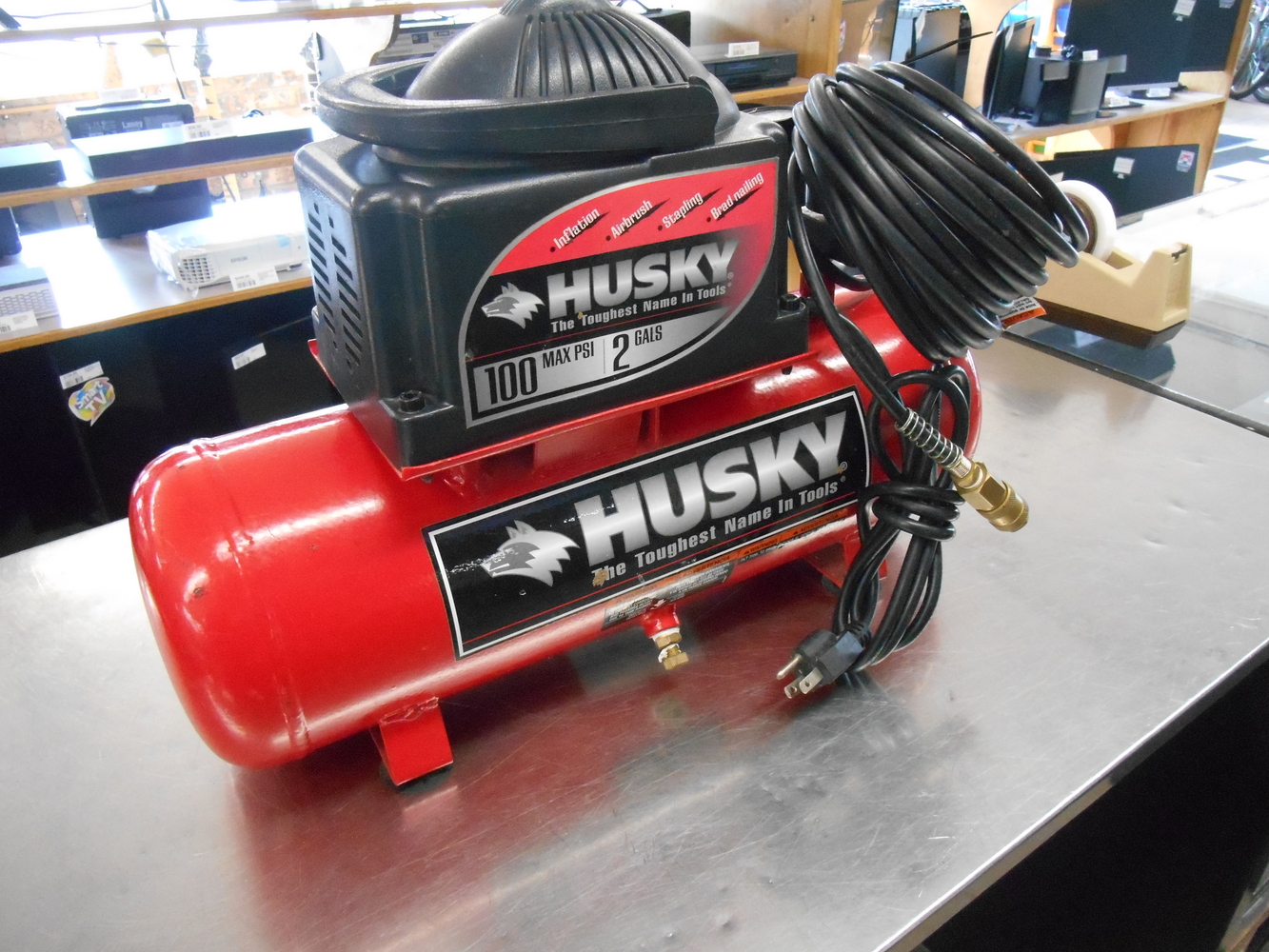 Husky 2 Gallon 100psi Compressor With Built In Air Hose.