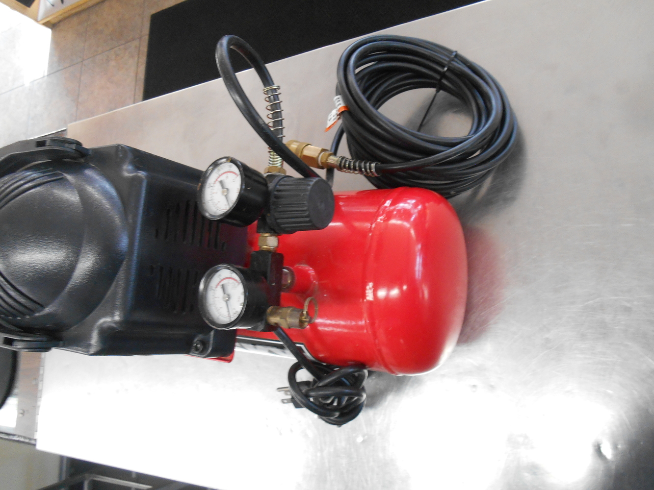 Husky 2 Gallon 100psi Compressor With Built In Air Hose.
