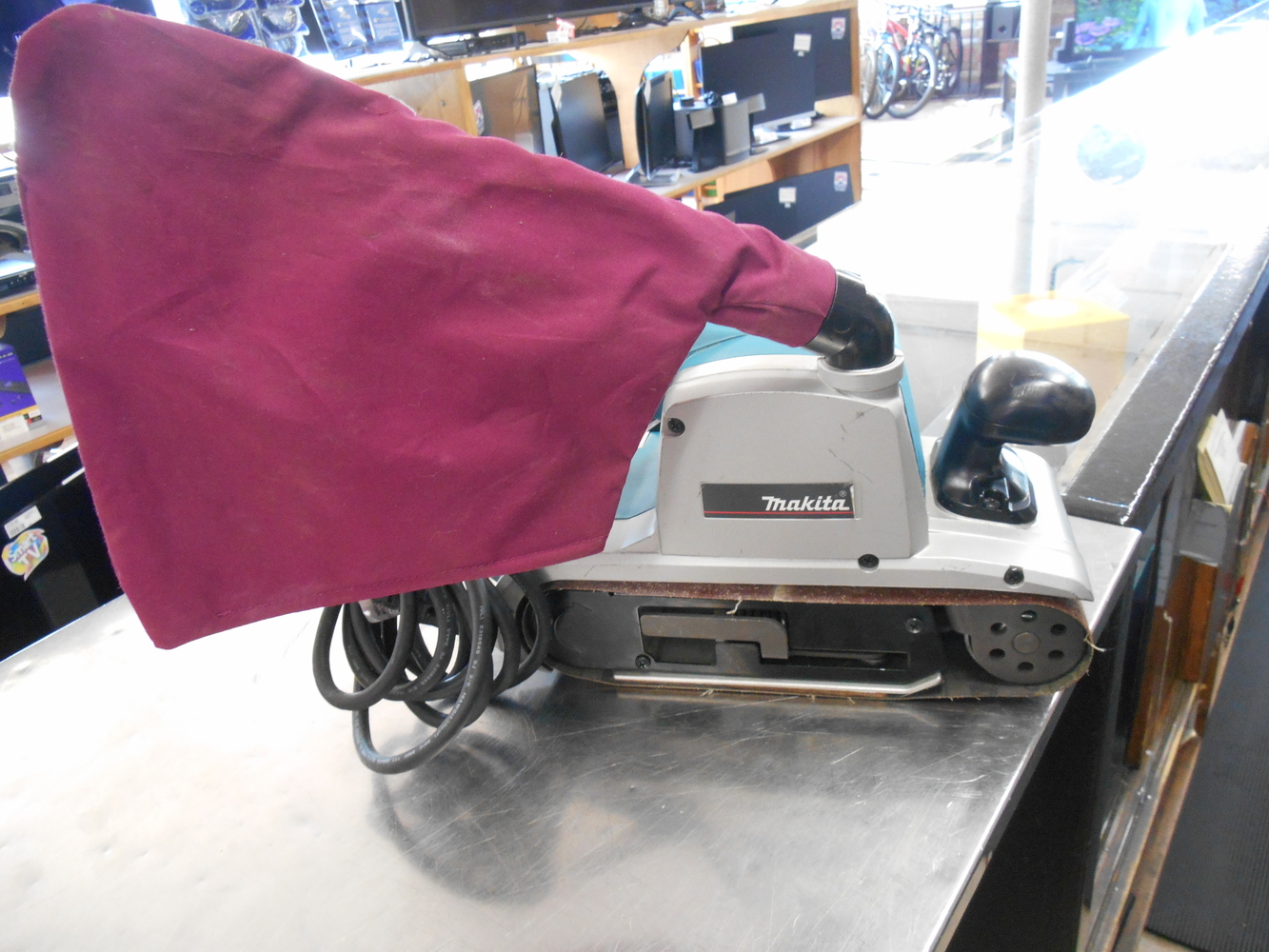 Makita11 Amp 4 in. x 24 in. Corded Belt Sander with Abrasive Belt and Dust Bag