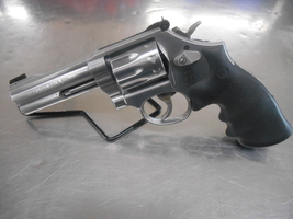 Smith & Wesson 617 22 Long Rifle 4in Satin Stainless Revolver - 10 Rounds