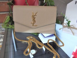 SAINT LAURENT UPTOWN CHAIN WALLET IN GRAIN DE POUDRE EMBOSSED LEATHER